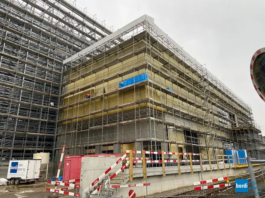 Fassadensanierung Industriegebäude mit Steinwoll-Dämmung in Hägendorf | bordi maler + gipser ag